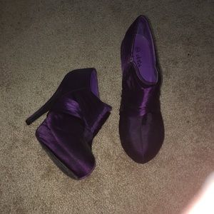 Purple boot like heels